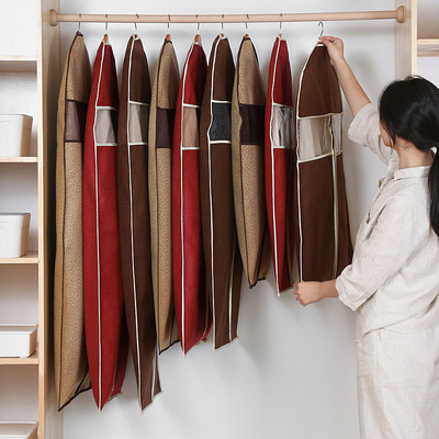 Non-woven fabric dust cover clothes a dust cover Embossed Non-woven fabric Hanging pocket overcoat man 's suit Storage dustproof Bag