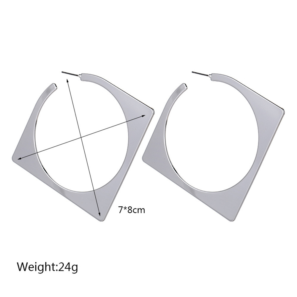 Diamond-shaped gold and silver geometric earrings