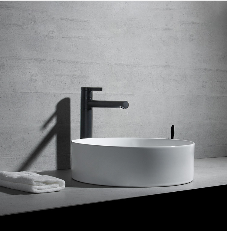 Fábrica al por mayor ultra delgada Mesa Redonda lavabo cuarto de baño pequeño apartamento lavabo piscina lavabo de cerámica tamaño pequeño