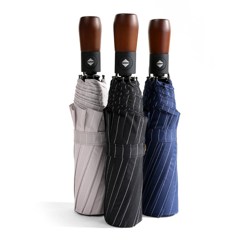 Fully automatic solid wood handle umbrella ten-bone windproof umbrella three-fold fair or rainy folding umbrella men's high-end business advertising umbrella