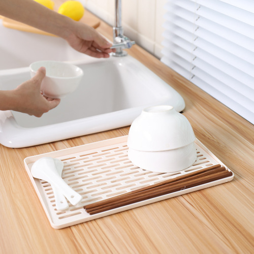 A multi-purpose plastic cup holder and tray for kitchen use, suitable for selling on AliExpress, with hollow design for draining water cups