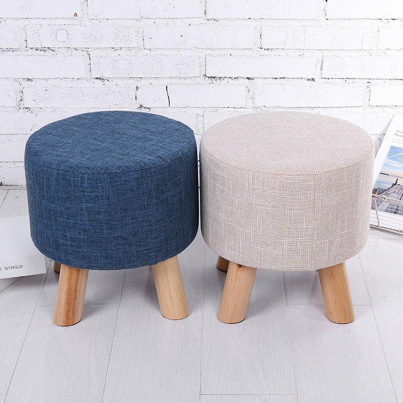 Suministro de fábrica creativo Cambio de zapatos taburete bajo taburete de cuatro patas extraíble y lavable hogar diario taburete Lino taburete redondo taburete de madera maciza