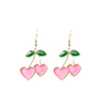Fuchsia universal brand golden metal earrings heart-shaped