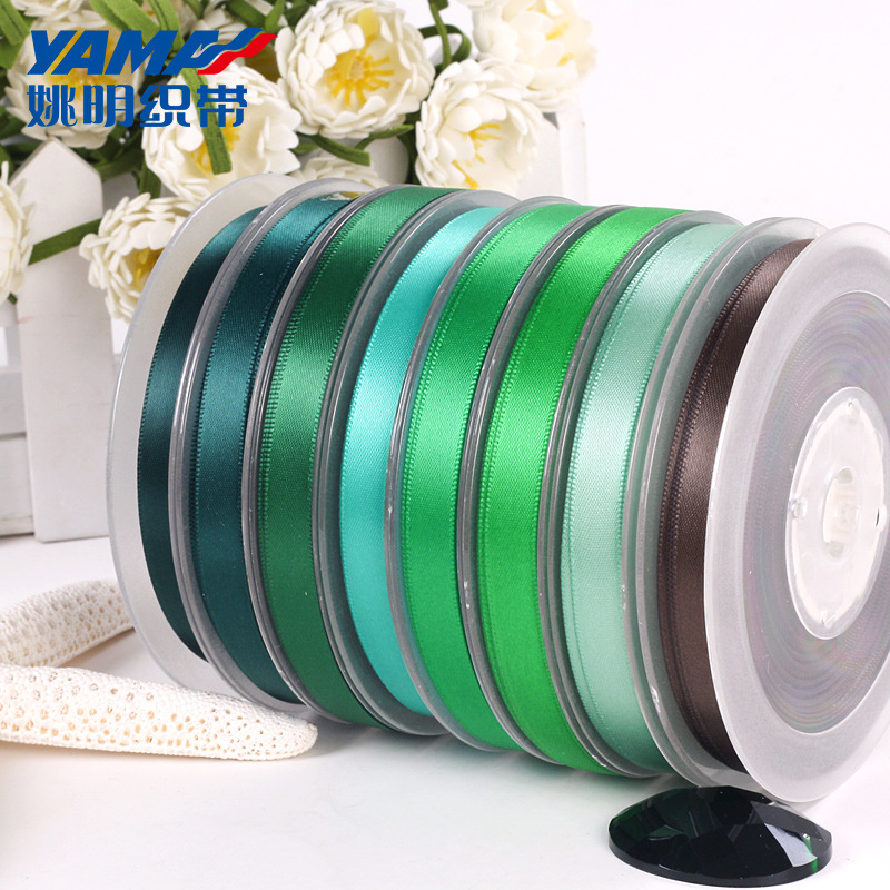 Yao Ming cinta al por mayor de doble cara de la cinta de satén DIY accesorios para el cabello 89mm serie Verde 563-593