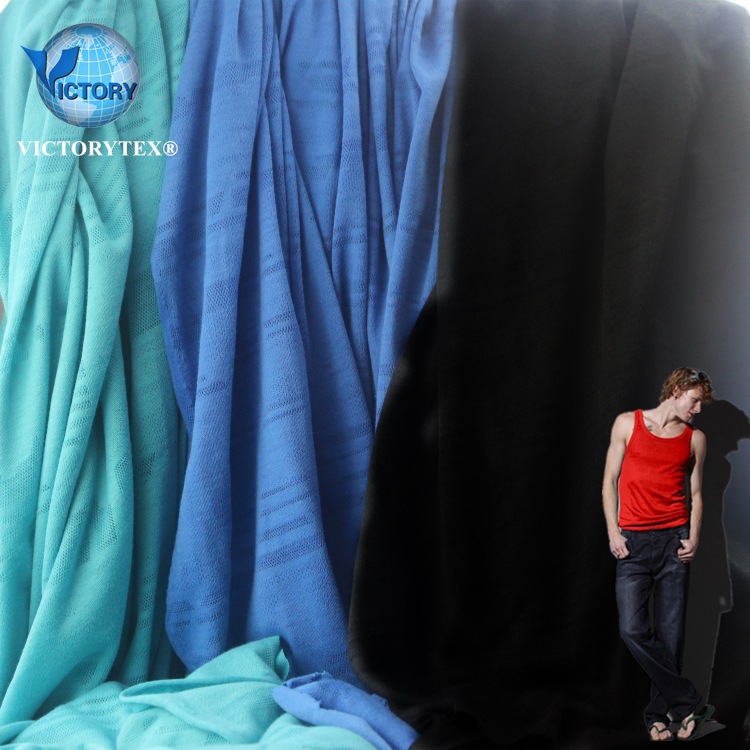 时尚T恤面料针织纬编后整速干仿烂花短纤低弹全涤提花汗布单面布