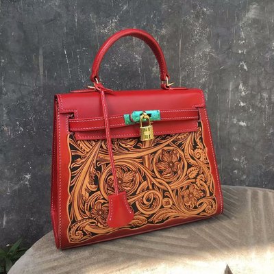 Red fire fish 2019 new pattern fashion genuine leather lady Handbag Ethnic style Retro manual Cowhide Nameplate Bag