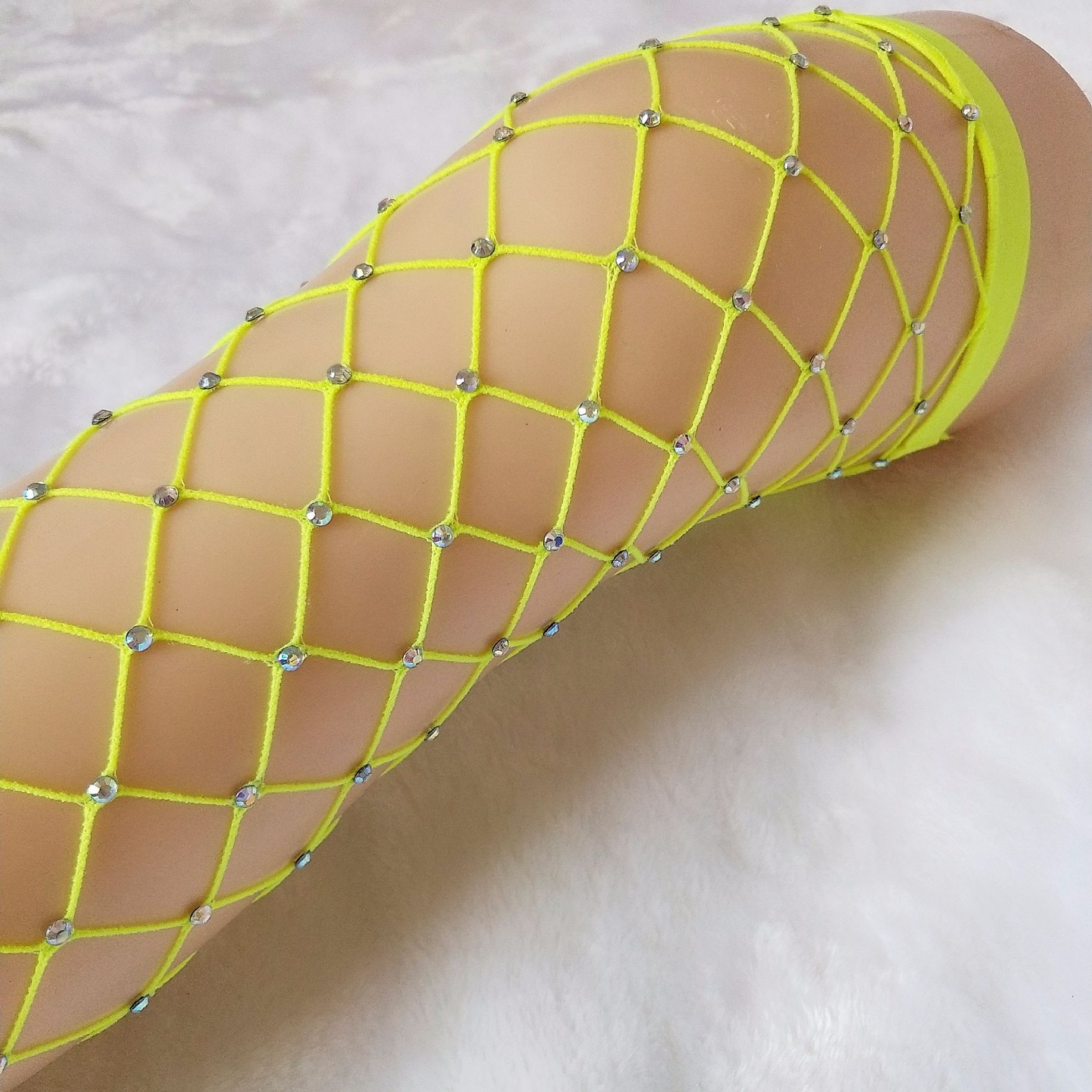 Rhinestone Radiance: Fishnet Stockings to Highlight Your Legs