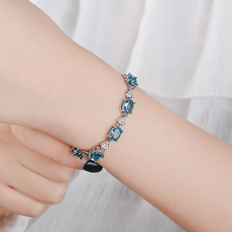 Tmall Synthetic Swiss Blue Topaz Bracelet Imitation Silver Plated Silver Plated Platinum 18K Rose Gold Two-color Hand Jewelry Tmall Synthetic Swiss Blue Topaz Bracelet Imitation Silver Plated Silver Plated Platinum 18K Rose Gold Two-color Hand Jewelry