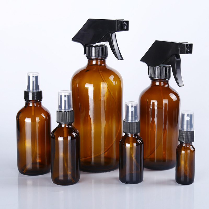 Cubierta integrada transparente líquido sub-botella de vidrio sellado Boston botella antideslizante cubierta de baquelita botella de aceite esencial al por mayor