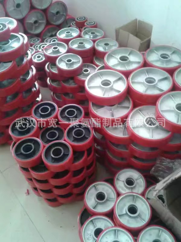 供应武汉加工载重滚轮聚氨酯橡胶包胶