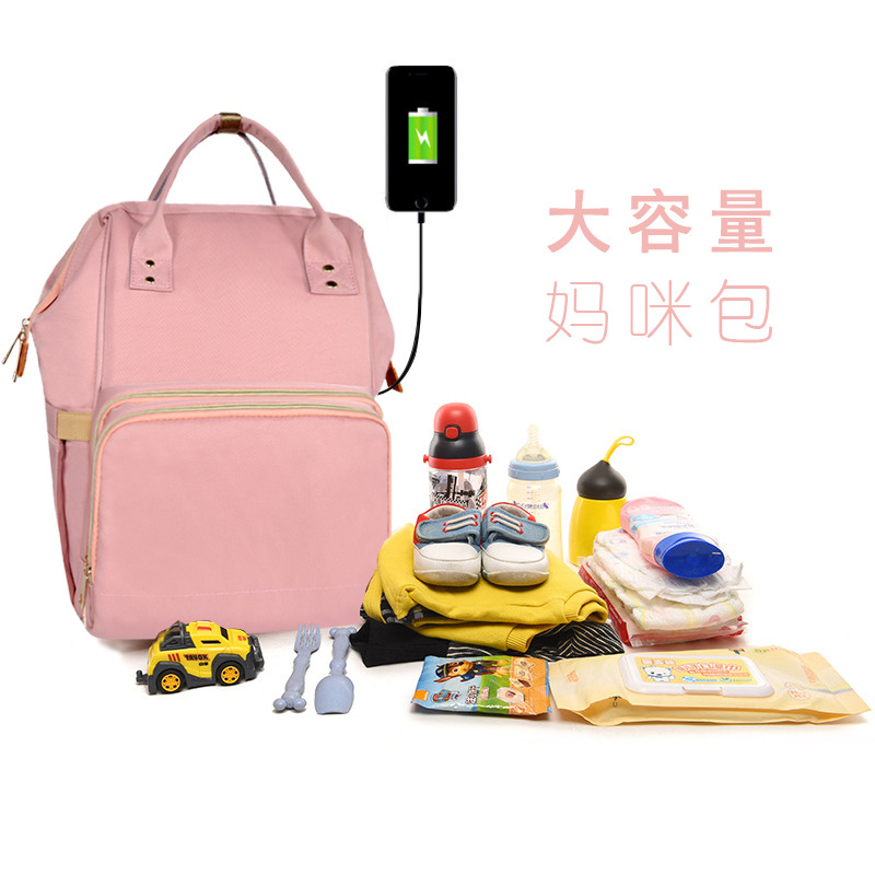 The new charge USB knapsack Mummy Bag High-capacity Mother-Baby Pack waterproof fashion Backpack Feeding bottle multi-function