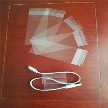 定制东莞opp片材手机数据线包装袋子带自粘胶条opp透明单片膜