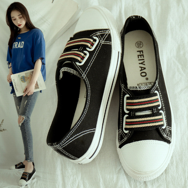 Giày mùa hè bay bằng vải canvas nữ phiên bản tiếng Hàn của kẹo màu phẳng giày thông thường dành cho sinh viên đặt giày lười chân L-757 Giày vải nữ