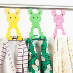 Hanger behind the rabbit door, hook on the back of the door, shelf for hanging clothes, hook for hanging clothes, door hook, hanger behind the door