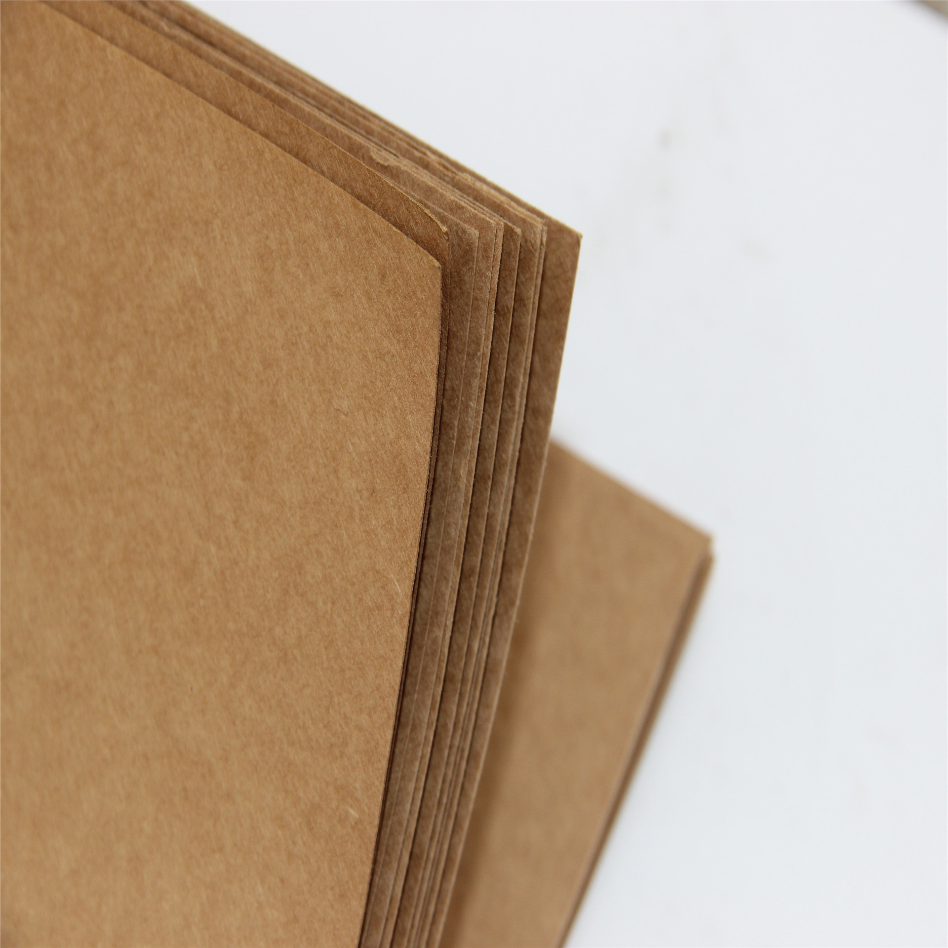 供应供应175-440克印刷建材纸 服装 食品包装 产品垫层牛卡纸