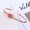 Bracelet natural stone, golden fashionable accessory, pink gold