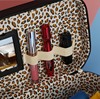 Cosmetic bag, mirror, handheld storage system