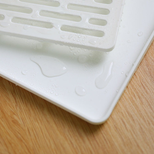 A multi-purpose plastic cup holder and tray for kitchen use, suitable for selling on AliExpress, with hollow design for draining water cups