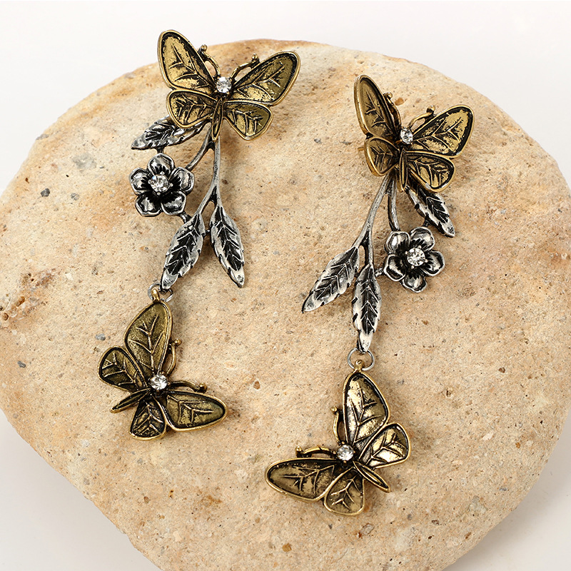 Nueva Joyería De Moda Retro Mariposa Geométrica Deja Flores Aretes Largos De Aleación display picture 5