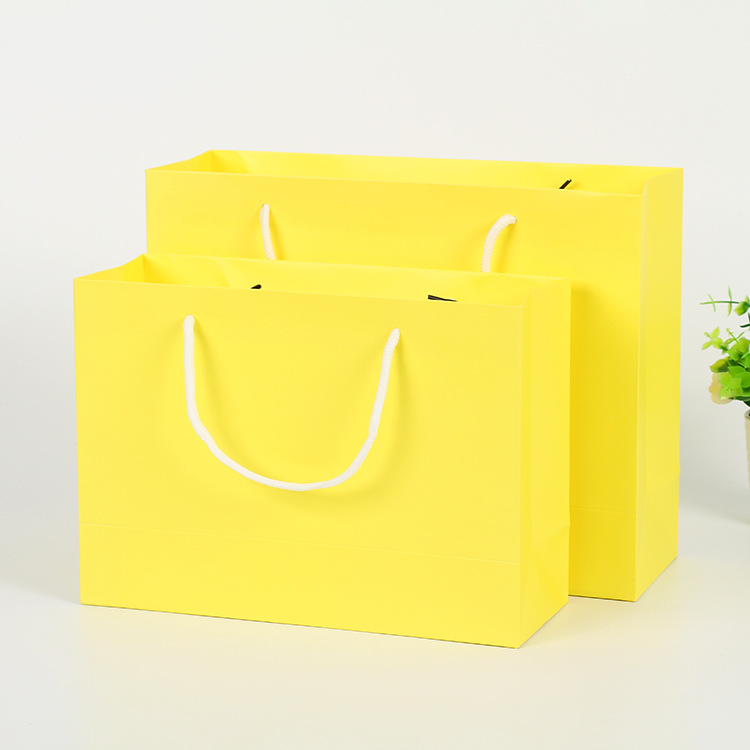 Fashionable yellow handheld shopping bag