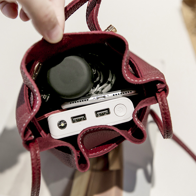 Guangzhou supply 2021 new simple bucket bag wide-band lock small bag Korean version casual solid color single shoulder_voghion.com