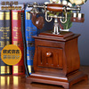 Old-fashioned antique retro wireless telephone from natural wood