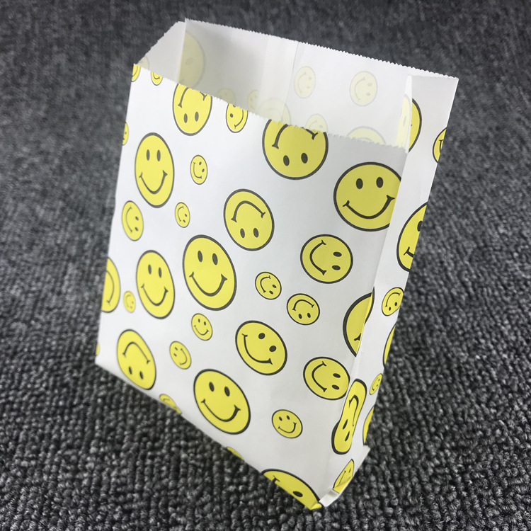 现货食品纸袋小吃袋黄色笑脸白纸袋鸡柳袋防油淋膜纸袋图案小包装