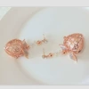 Golden earrings, pink gold
