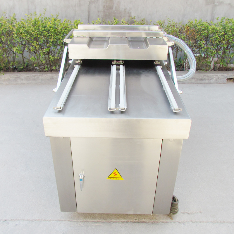 坤泰鸡翅鸡爪鸭脖鸭掌小包装食品摇臂式半自动四封条真空包装机