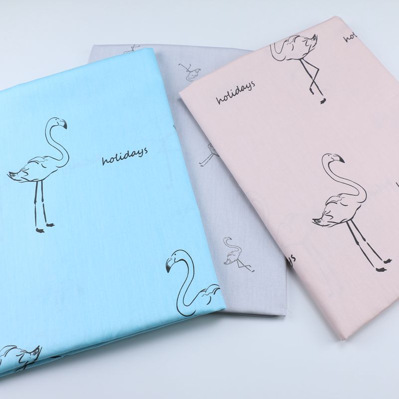 卡通火烈鸟印花布料 全棉儿童睡衣被单面料 幼儿园床上用品斜纹布