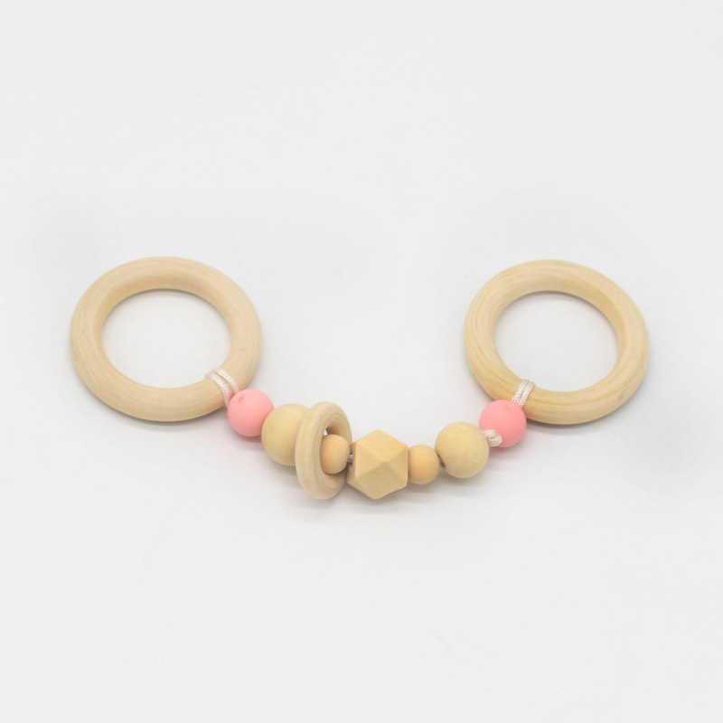 Suministros de bebé juguete de haya mordedor bebé Seguridad Protección del Medio Ambiente anillo de cuentas de silicona dientes molienda palo nuevo estilo