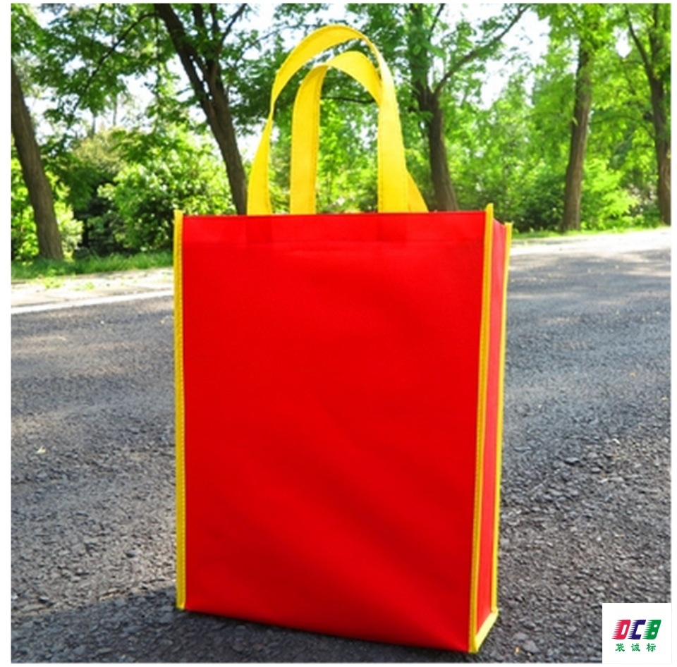 专业供应喜庆大红色环保袋 广州立体手提袋印刷无纺布袋热压袋厂