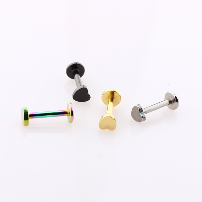 Silver pointed spike labret stud material detail