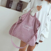 Capacious bag strap one shoulder with letters, with embroidery