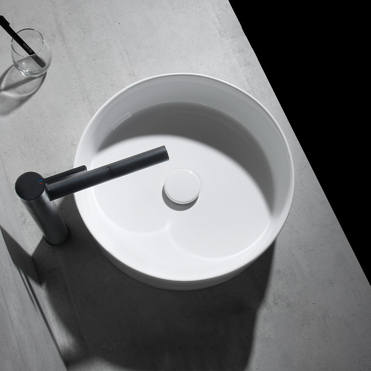 Fábrica al por mayor ultra delgada Mesa Redonda lavabo cuarto de baño pequeño apartamento lavabo piscina lavabo de cerámica tamaño pequeño