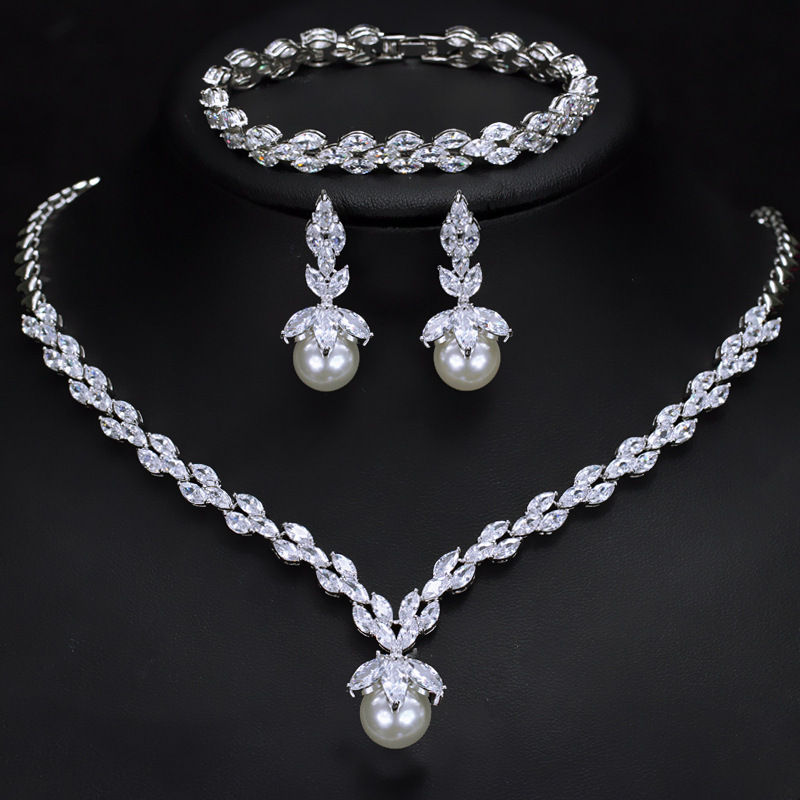 Japanese and Korean bridal AAA zircon chain shell pearl bracelet earrings necklace three-piece factory direct sales