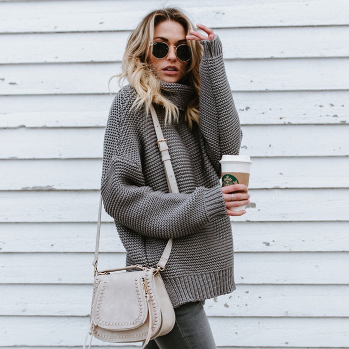 2023 otoño e invierno europeo y americano Amazon eBay popular color sólido suéter de manga larga cuello alto suéter de las mujeres entrega de una sola pieza