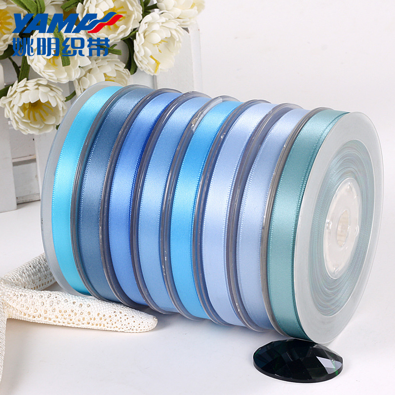 Yao Ming suministro de cinta de una sola cara cinta de satén de poliéster DIY rollo completo 100mm serie Azul 303-333
