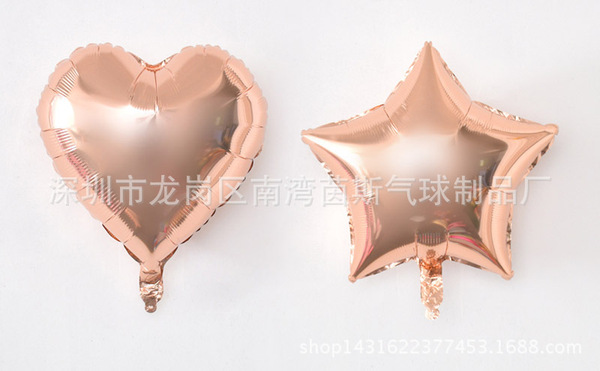 golden balloon heart shaped
