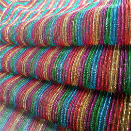 柯桥厂家金银丝网布幻灯丝彩条压皱亮丝衣装裤亮光绉纱南美面料