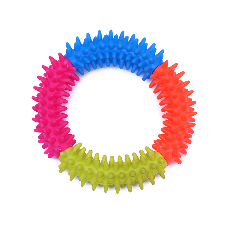 Ventas directas de fábrica nuevo TPR dientes molienda círculo color púas pegamento suave mordedura resistente perro juguete suministros para mascotas