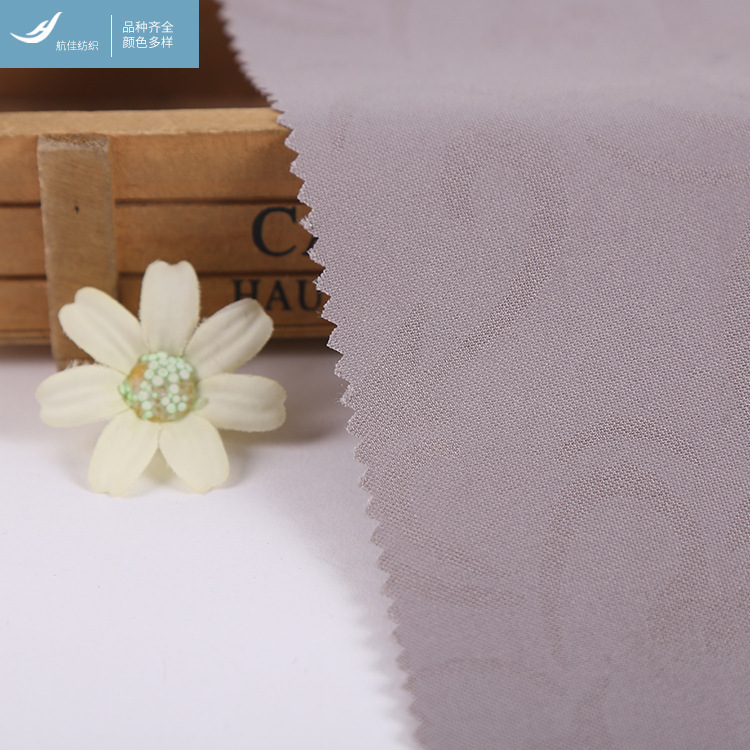 订货生产 压花平纹罗尔呢面料 箱包酒店服装面料 航佳国际