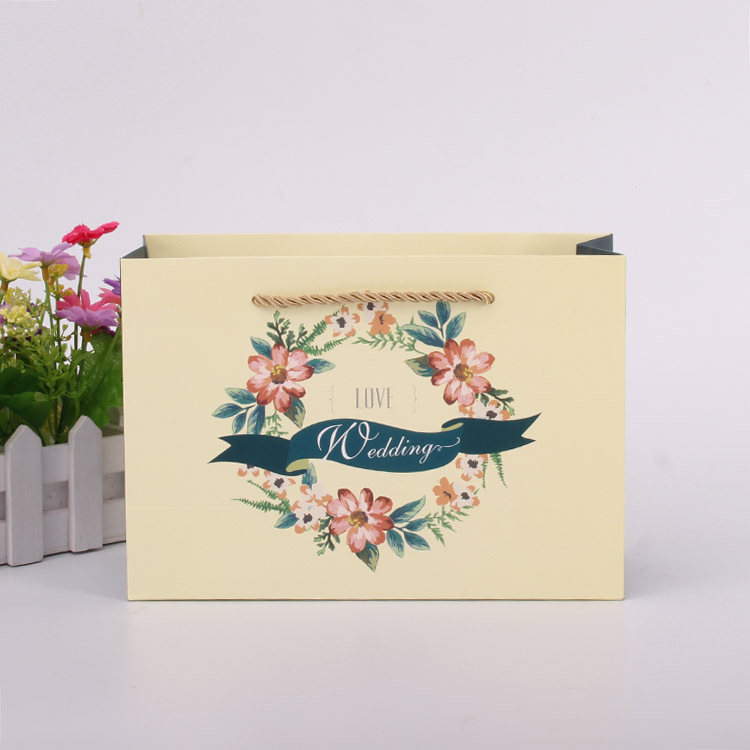 厂家直销精致礼品手提袋定做 白卡纸烫金服装纸袋定制彩印logo