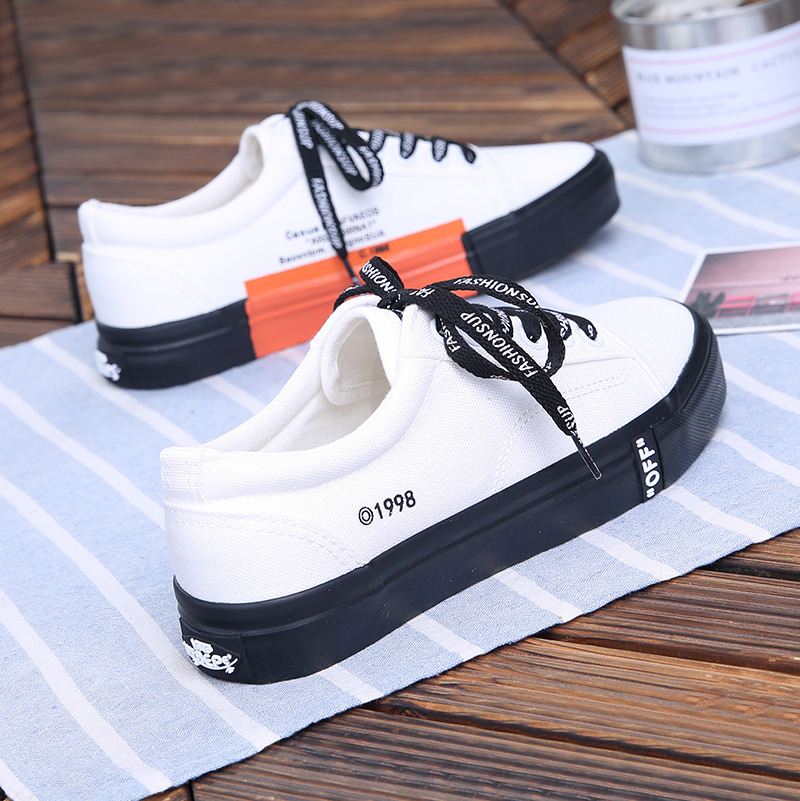 white flat canvas shoes