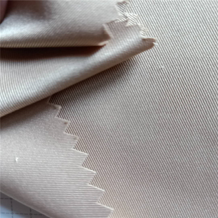 现货供应优质全涤高弹丝风衣面料T400时尚男女士棉服夹克裤子面料