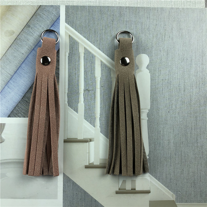 供应超纤流苏拉片 加工服装箱包拉链头包包挂件 款式可定做