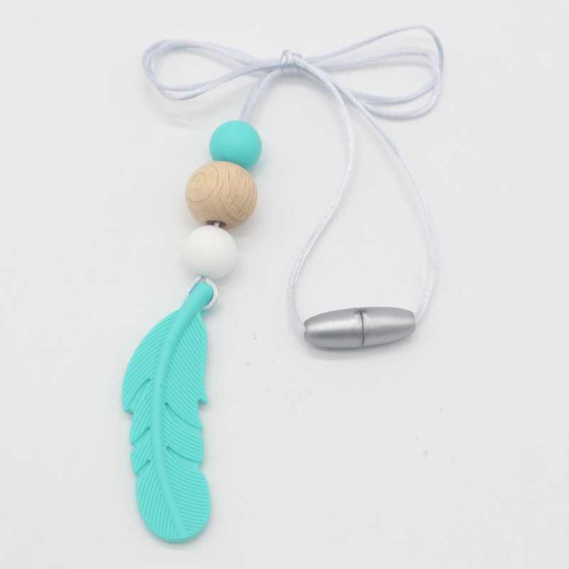 Amazon nueva pluma mordedor collar bebé calmante molar silicona seguridad ambiental Beech bead collar