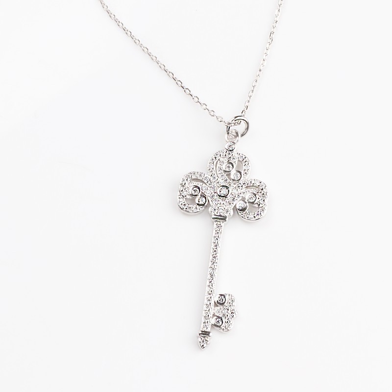 Platinum long fashionable pendant for keys with zircon
