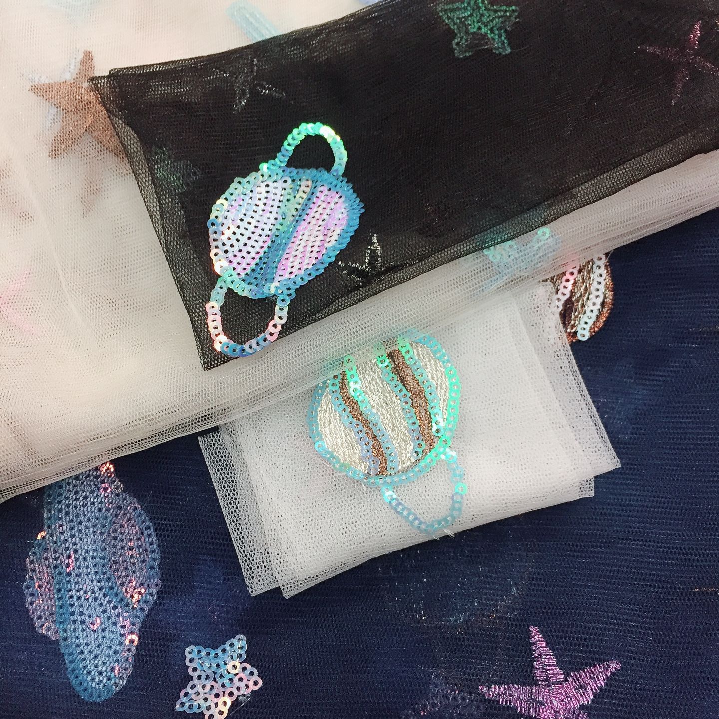 爆款网眼布刺绣 银河系星河飞碟绣片撞色绣花海星 裙子面料现货