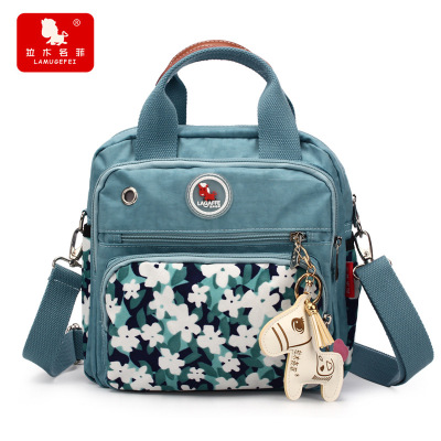 新款媽咪包多功能女包百搭休閑旅行防水手提包背包母嬰媽媽包